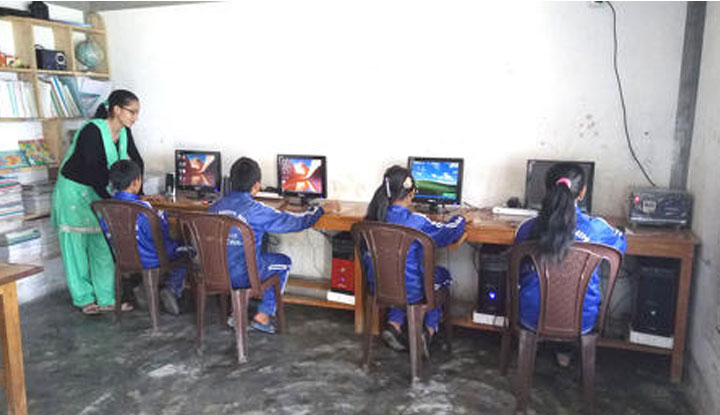 Napal school children learning on new funded computers